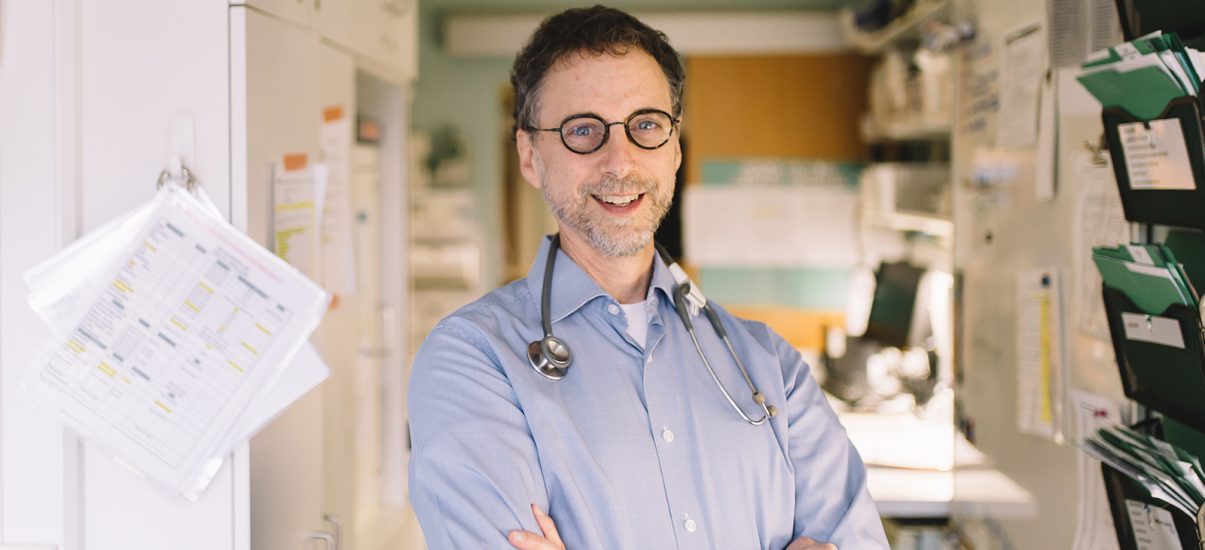 Canuck Place Dr. Hal Siden smiling while on the clinical floor at Canuck Place Children's Hospice