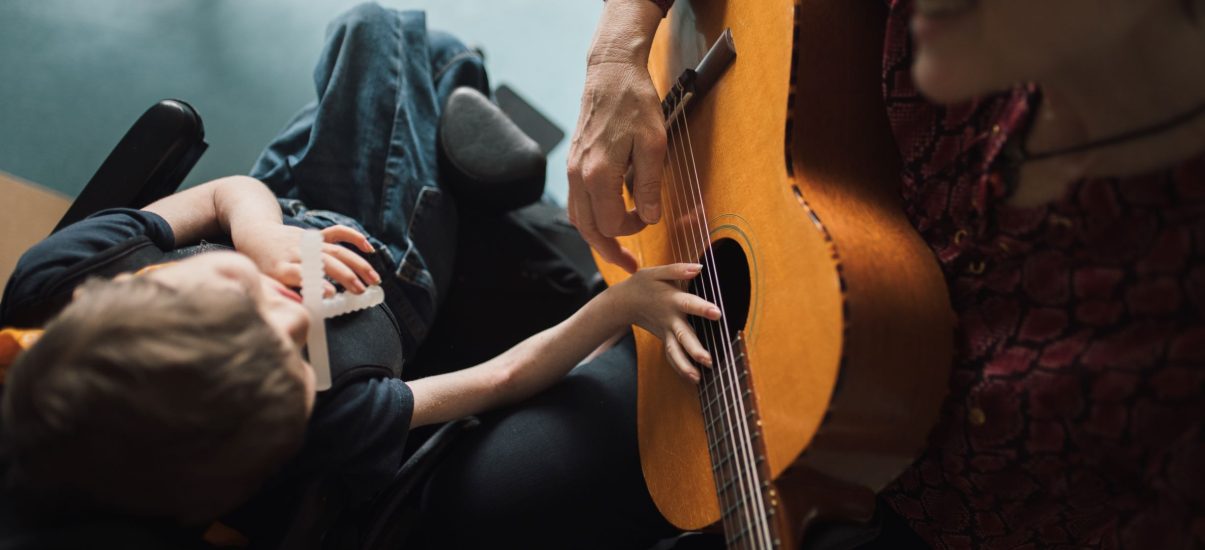 Child during music therapy session in pediatric palliative care