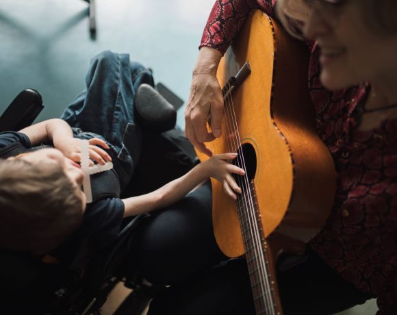 Child during music therapy session in pediatric palliative care