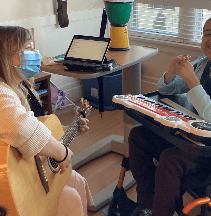 Music Therapist, Michaela Wallis with Armaan, Canuck Place Teen