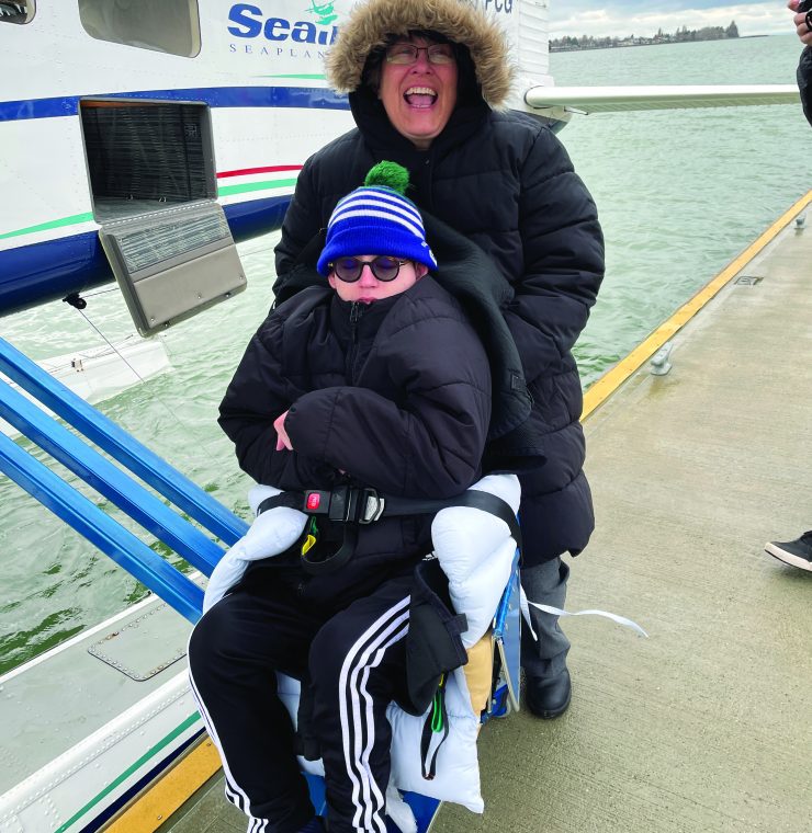 Canuck Place teen Griffin gets ready to embark on sea plane for recreation therapy activity