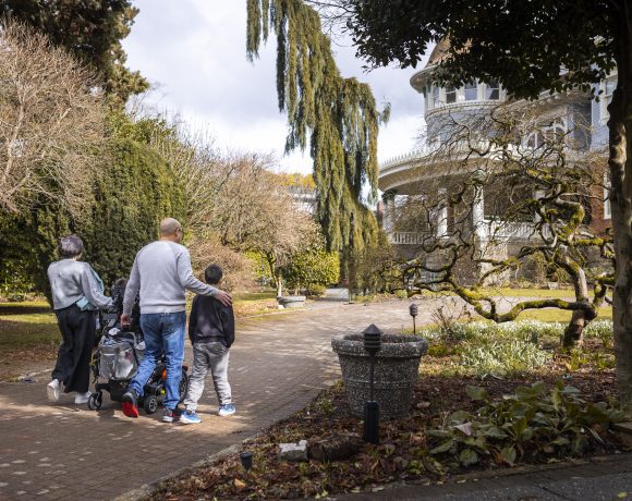Family walking towards Canuck place