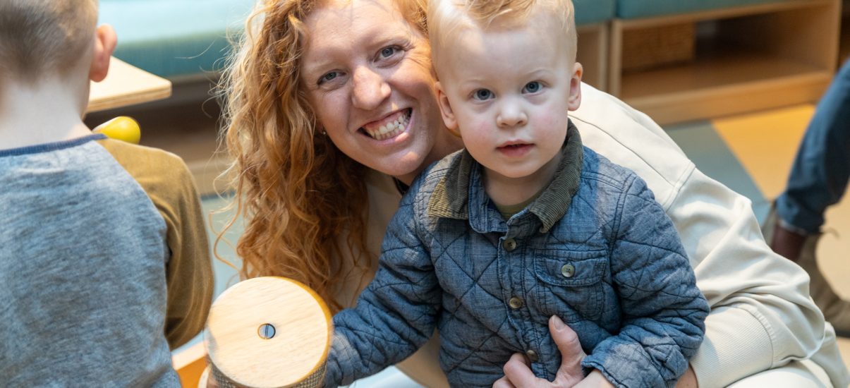 The Braun family enjoy a Music Therapy sessions with Canuck Place Music Therapist Michaela Wallis.