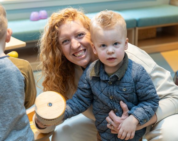 The Braun family enjoy a Music Therapy sessions with Canuck Place Music Therapist Michaela Wallis.