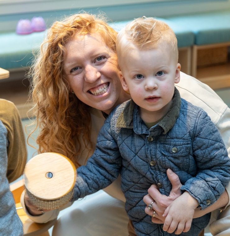 The Braun family enjoy a Music Therapy sessions with Canuck Place Music Therapist Michaela Wallis.