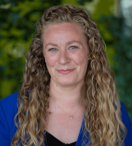 Meagan Colenutt Canuck Place FAC chair poses for a portrait