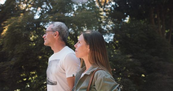 Two Canuck Place parents walking in the garden together