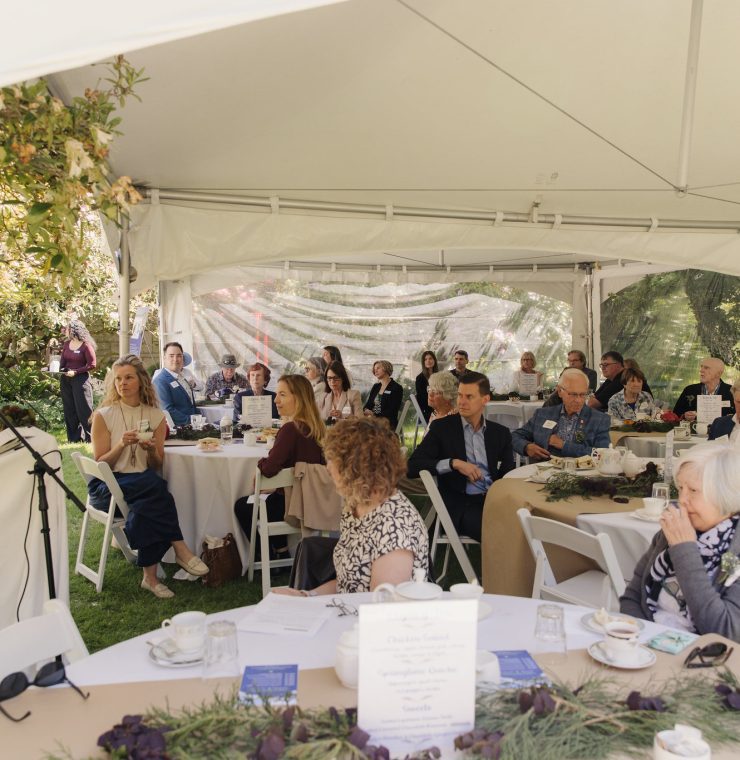Jennifer Polci, addressing guests at the annual Canuck Place Legacy Tea