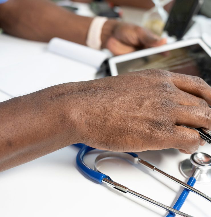 clinician with a tablet